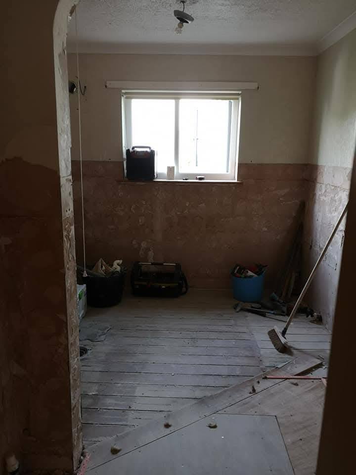 Master bathroom stripped back to the floorboards with tools and dust sheets in place before renovation by DW Plumbing & Heating